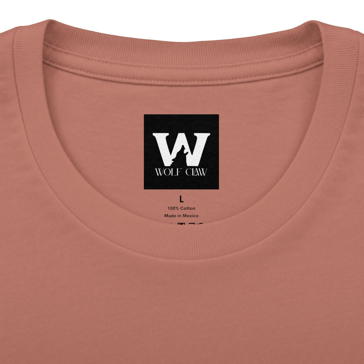Rust crew tee neckline with Wolf Claw logo patch and “100% Cotton” tag