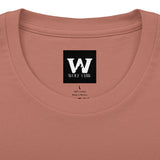 Rust crew tee neckline with Wolf Claw logo patch and “100% Cotton” tag